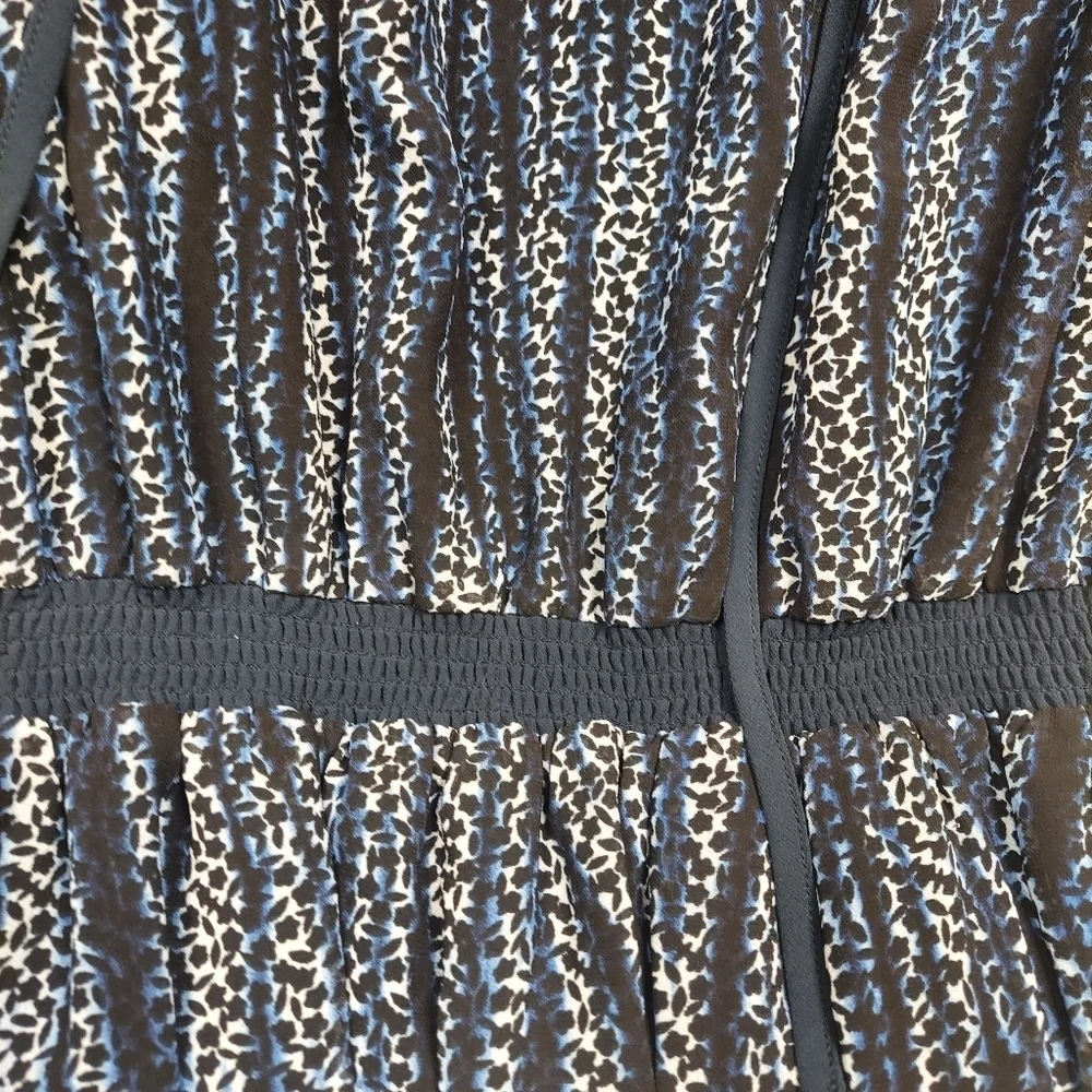 Michael Kors Women's Animal Print Peplum Top Elastic around waist Size Large